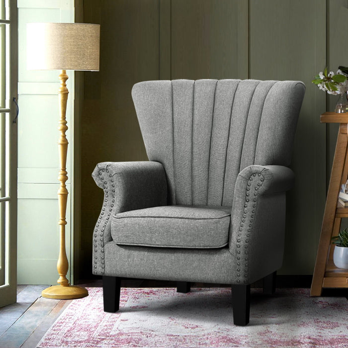 Grey fabric armchair 